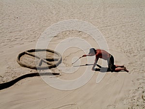 Homeless sand artist