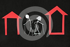 Homeless seniors, retirement home or abandoned old people concept. Elderly couple stick figure in dark black background creative