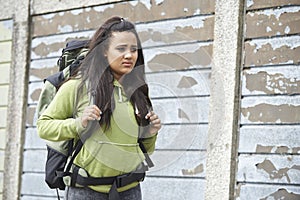 Homeless Teenage Girl On Street With Rucksack
