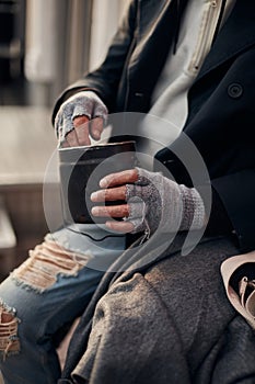 Closeup photo of beggar hands getting money