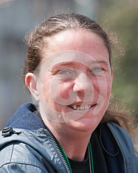 Homeless woman with bad teeth