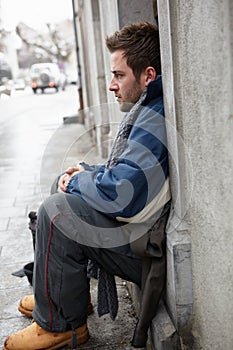 Homeless Young Man Begging In Street