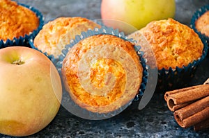 Homemade apple cheese muffins. Blue stone background. Seasonal b