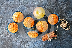 Homemade apple cheese muffins. Blue stone background. Seasonal b