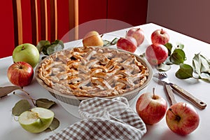 Homemade Apple Pie with fresh apples on a table background, Classic Thanksgiving dessert apple pie