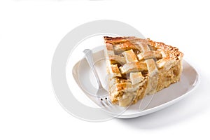 Homemade apple pie slice on white background.