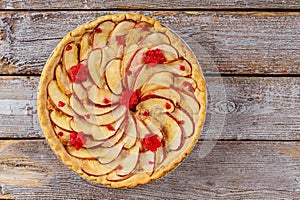 Homemade apple pie with sliced apple. Top view