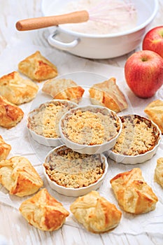 Homemade apple turnovers and small apple crumble cakes