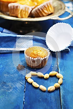 Homemade arabic sugar muffins and heart shape peanuts