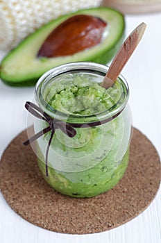 Homemade avocado mask. Prepared from mashed avocado and olive oil. Diy cosmetics.