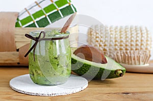 Homemade avocado mask. Prepared from mashed avocado and olive oil. Diy cosmetics.