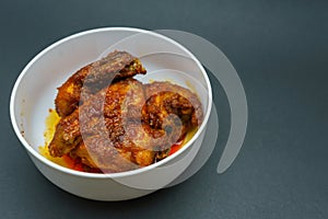 Homemade ayam sambal balado or spicy fried chicken is Traditional food from Padang
