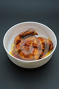 Homemade ayam sambal balado or spicy fried chicken is Traditional food from Padang
