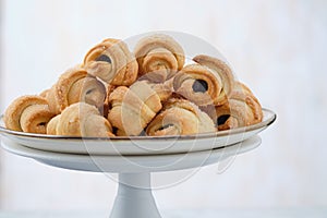 Homemade bagel cookies with marmalade inside. Sweet croissant cookies. Selective focus