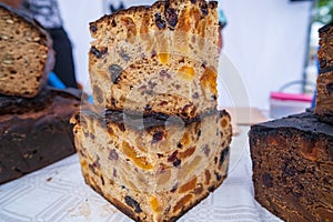 Homemade baked bread with fruit. Cut into large pieces. Homemakers' Market