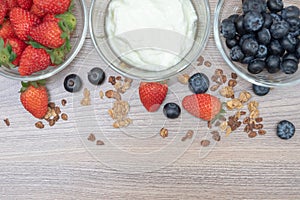 Homemade baked granola berry fruit yogurt