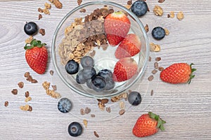 Homemade baked granola berry fruit yogurt