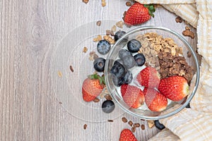 Homemade baked granola berry fruit yogurt