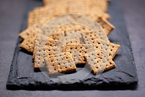 Homemade baked parmesan cheesse crackers with rosemary