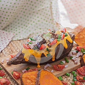 Baked and stuffed sweet potato photo