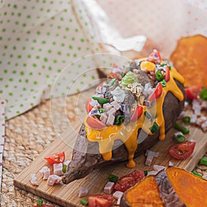 Baked and stuffed sweet potato photo