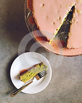 Homemade baking: matcha green tea cake with pink cherry icing