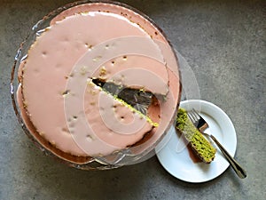 Homemade baking: matcha green tea cake with pink cherry icing