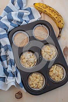 Homemade banana muffins on the wooden table