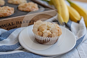 Homemade banana muffins on the wooden table