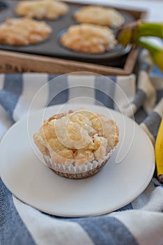 Homemade banana muffins on the wooden table