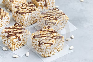 Homemade bars with crispy rice, honey and peanut butter, horizontal, copy space