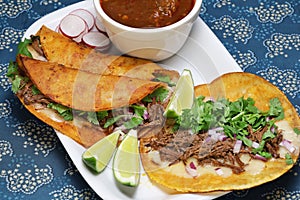 Homemade beef birria tacos photo
