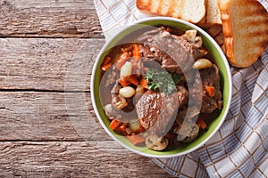 Homemade Beef Bourguignon in a bowl. horizontal top view