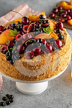 Homemade berries and cream sponge layer cake, tasty summer tea-time treat. Copy space.