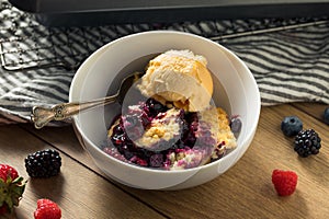 Homemade Berry Cobbler with Ice Cream