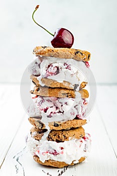 Homemade Black Forest roasted cherry ice cream sandwiches with chocolate chip cookies.