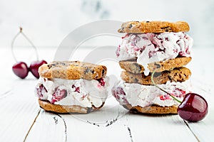 Homemade Black Forest roasted cherry ice cream sandwiches with chocolate chip cookies.