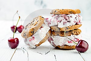 Homemade Black Forest roasted cherry ice cream sandwiches with chocolate chip cookies.
