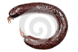 Homemade black pudding on a white background.
