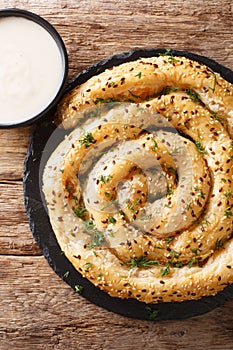 Homemade borek burek pie with feta cheese close-up. Vertical top view