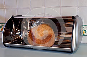 Homemade bread in a bread box