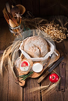 Homemade bread with cream and tomato