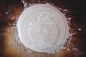 Homemade bread loaf made out of white wheat flour and mother dough right before being baked.