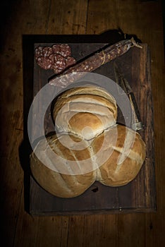 homemade bread, salami and knife