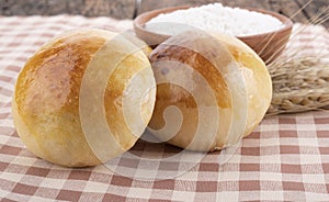 Homemade bread on wooden background