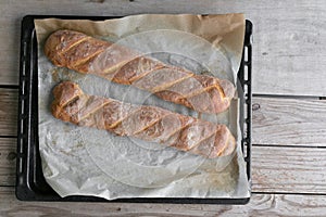 Homemade bread on a wooden backround