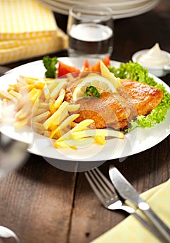 Homemade Breaded German Weiner Schnitzel with Potatoes.