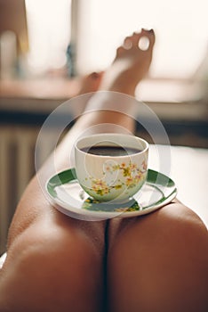Woman and Coffee at home for breackfast photo