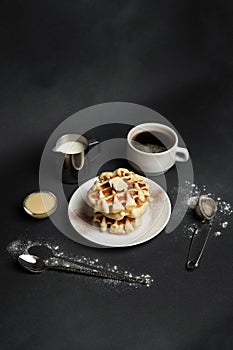 Homemade of Breakfast tasty Waffles, Caramel Sauce, Coffee Cup, Milk, dessertspoon, strainer