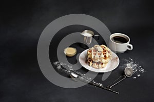 Homemade of Breakfast tasty Waffles, Caramel Sauce, Coffee Cup, Milk, dessertspoon, strainer